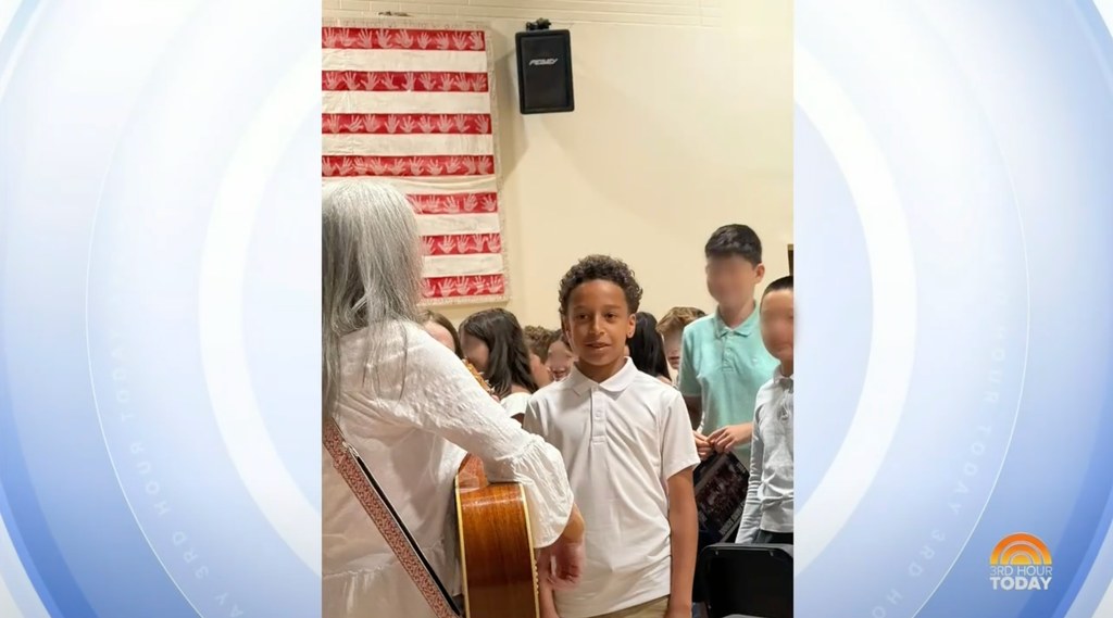 Craig's son Delano during his move up ceremony 