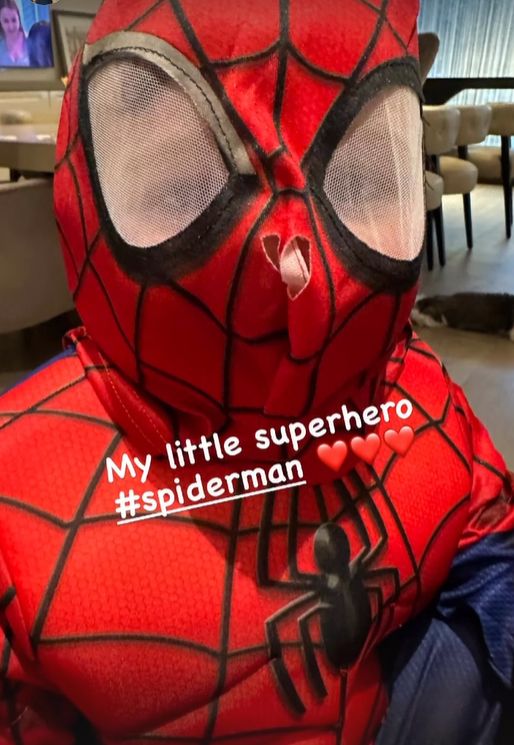 Young boy dressed up as Spider-Man