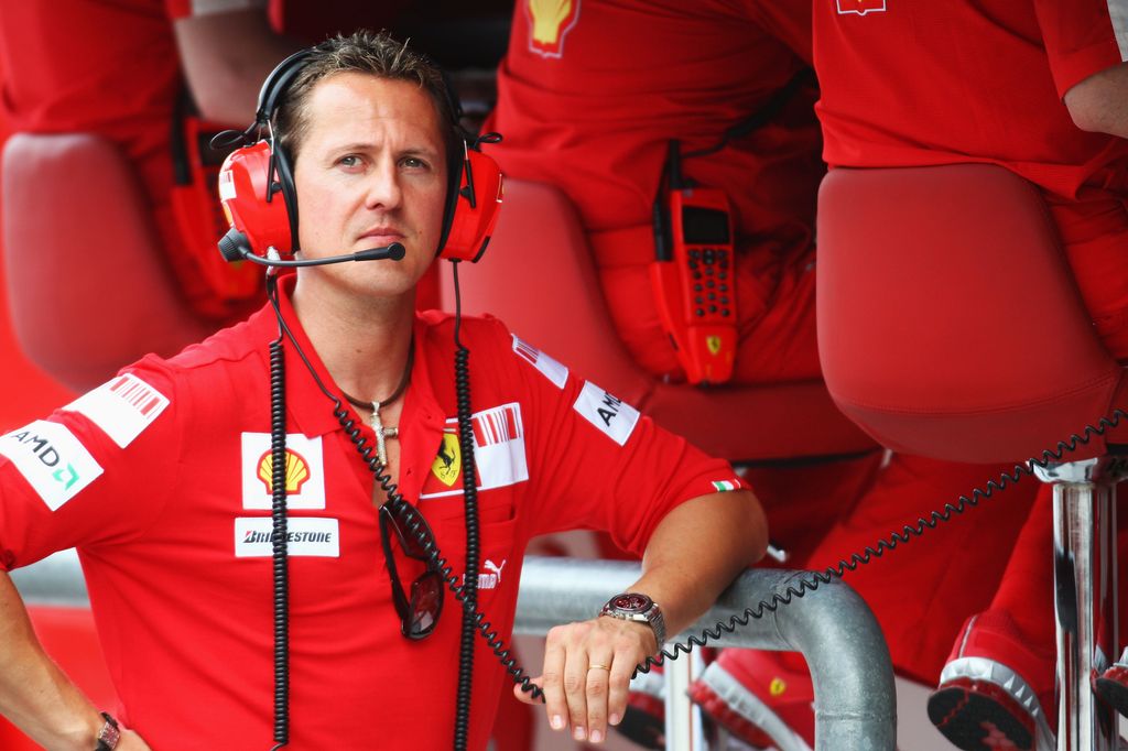 Former Ferrari Formula One World Champion Michael Schumacher of Germany is seen on the Ferrari pitwall before qualifying for the Malaysian Formula One Grand Prix at the Sepang Circuit on April 4, 2009 in Kuala Lumpur, Malaysia
