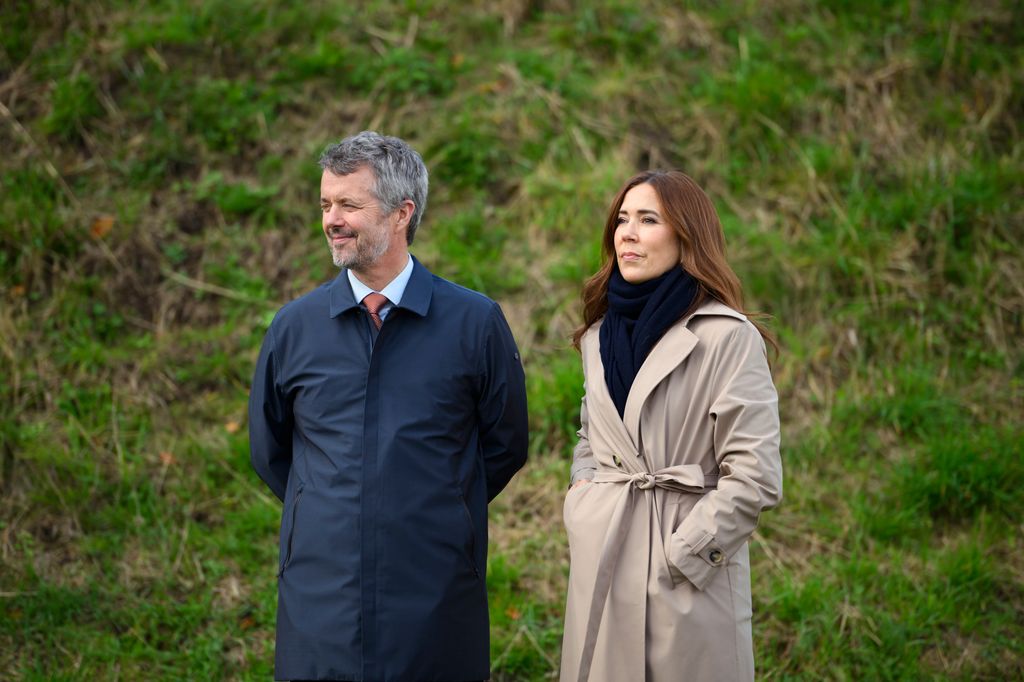 King Frederik and Queen Mary looking serious in Germany