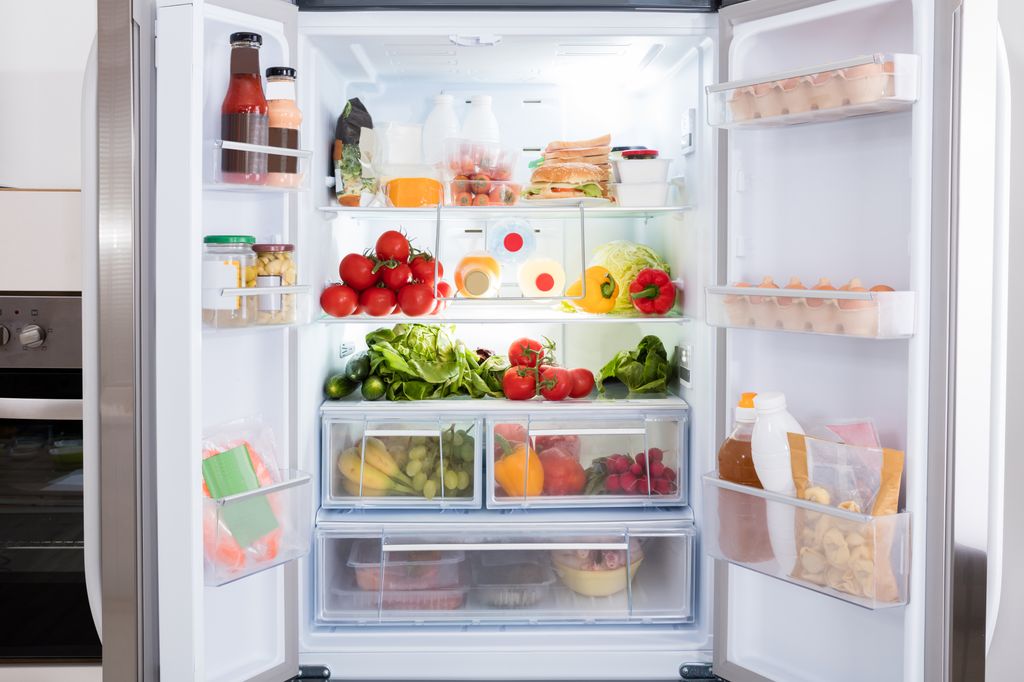 A fridge full of fresh fruit and vegetables