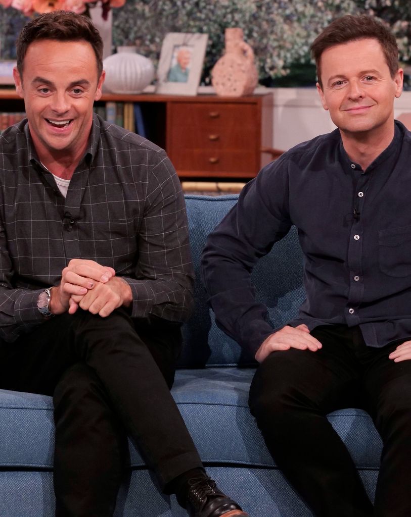 Anthony McPartlin and Declan Donnelly sitting on a blue sofa