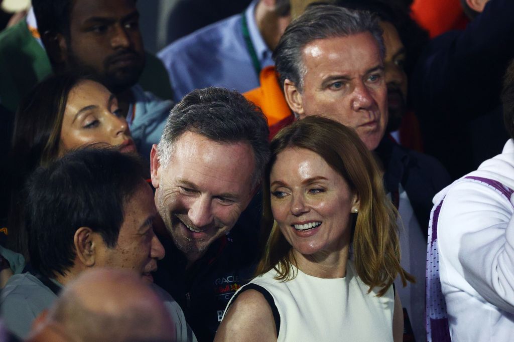 Geri Horner and Christian Horner laughing with a man