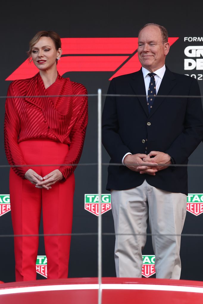 Princess Charlene dengan pakaian merah di Grand Prix Monaco