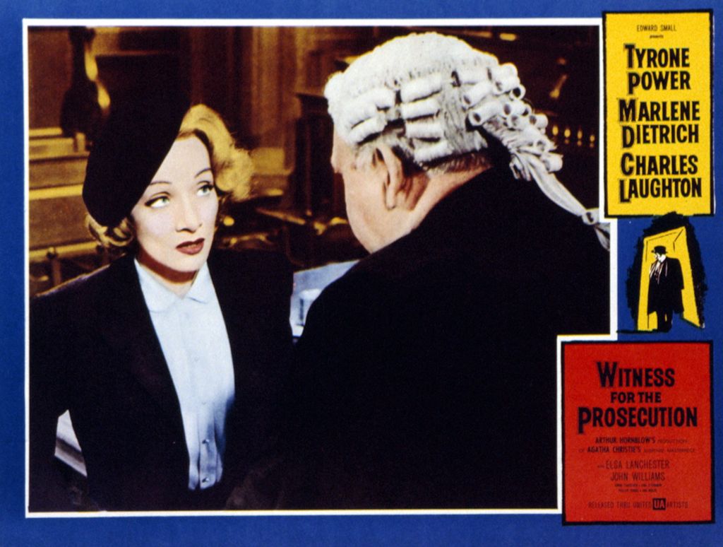 A woman speaks to a judge