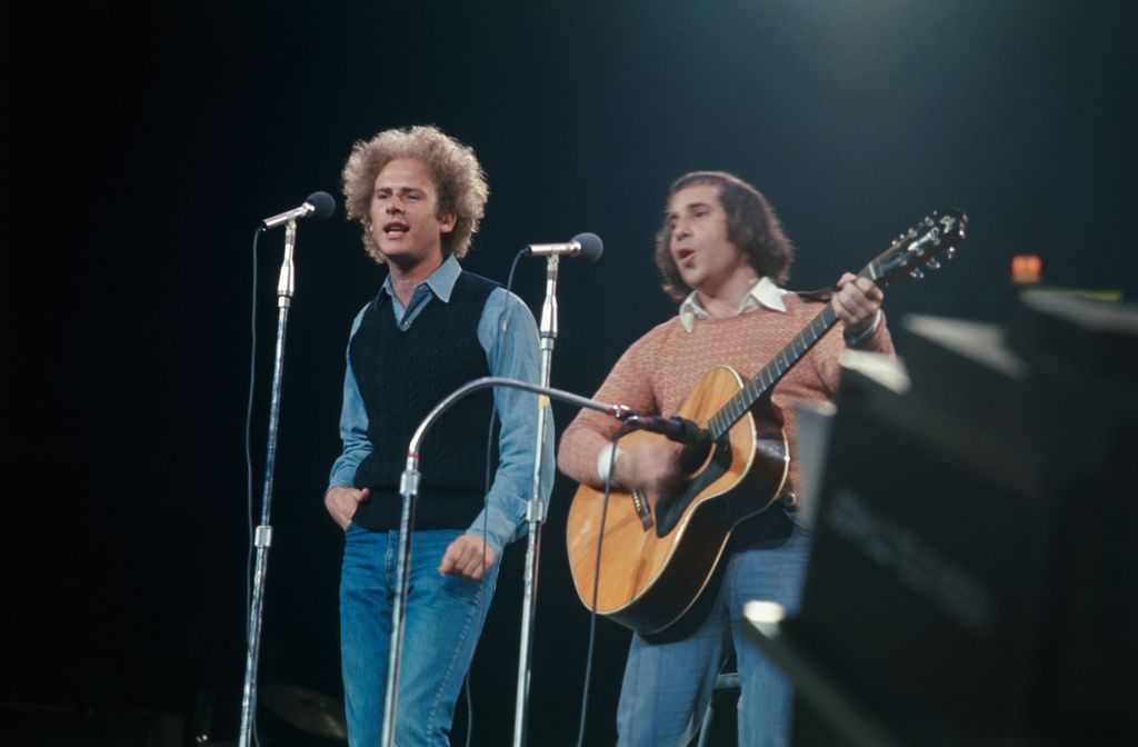 (Original Caption) New York, New York. Art Garfunkel (left) and Paul Simon, formerly a composing and performing duo, get together again at the rally at Madison Square Garden for Senator George McGovern, who is seeking the Democratic presidential nomination.