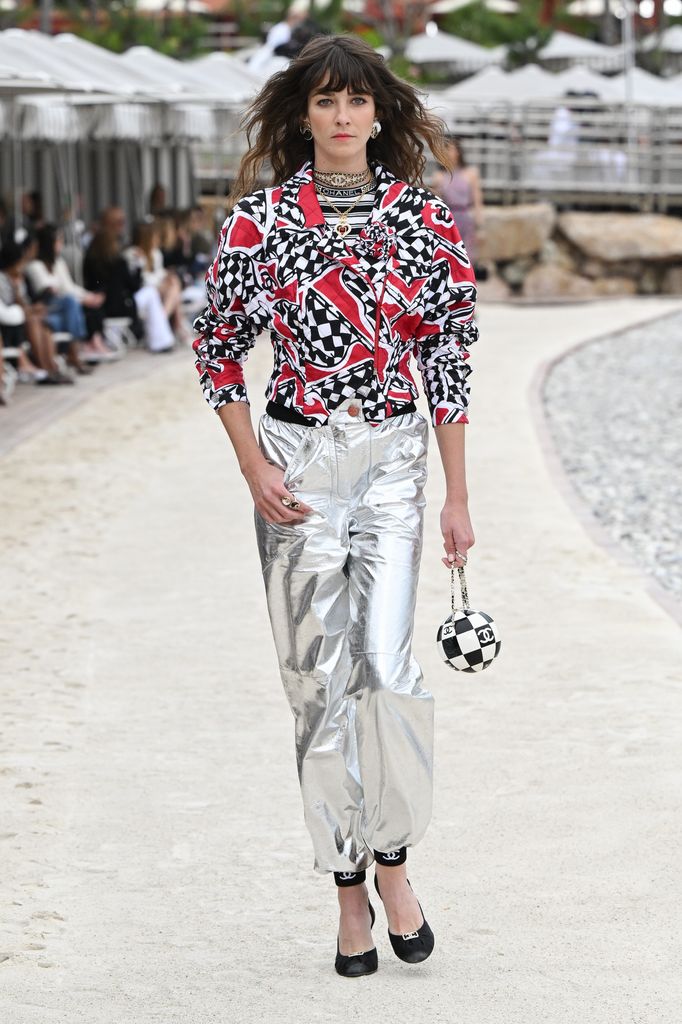 A model walks the runway during the Chanel Cruise 2023 Collection on May 05, 2022 in Monte-Carlo, Monaco. (Photo by Stephane Cardinale - Corbis/Corbis via Getty Images)