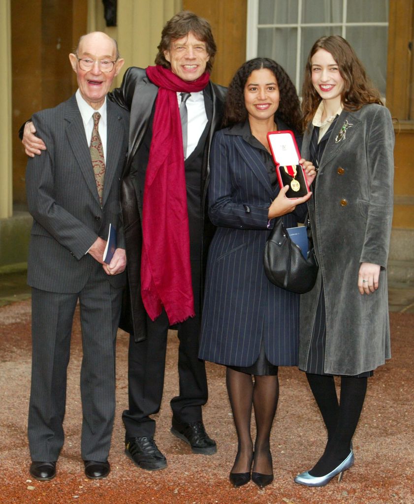 Mick Jagger with his father and daughters Karis and Elizabeth after receiving a knighthood