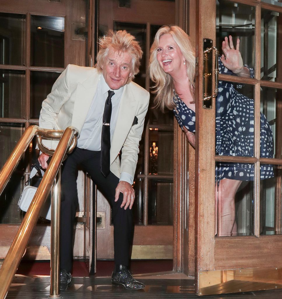 Rod Stewart and wife Penny Lancaster strike a pose as they leave The Ritz in London