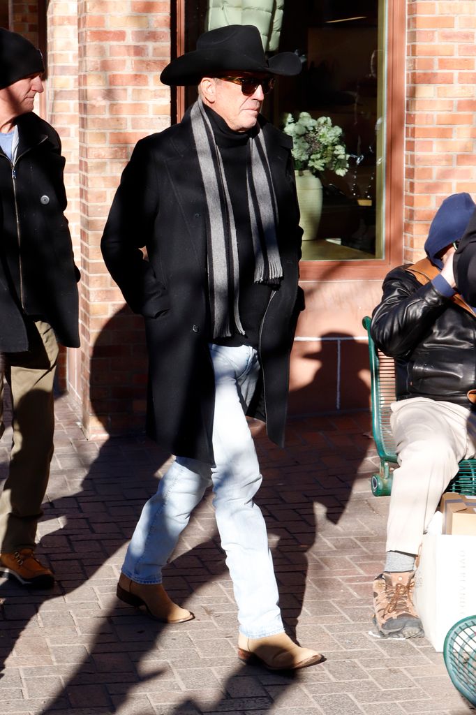 Kevin Costner is seen on December 29, 2023 in Aspen, Colorado in a black hat, sunglasses and black coat