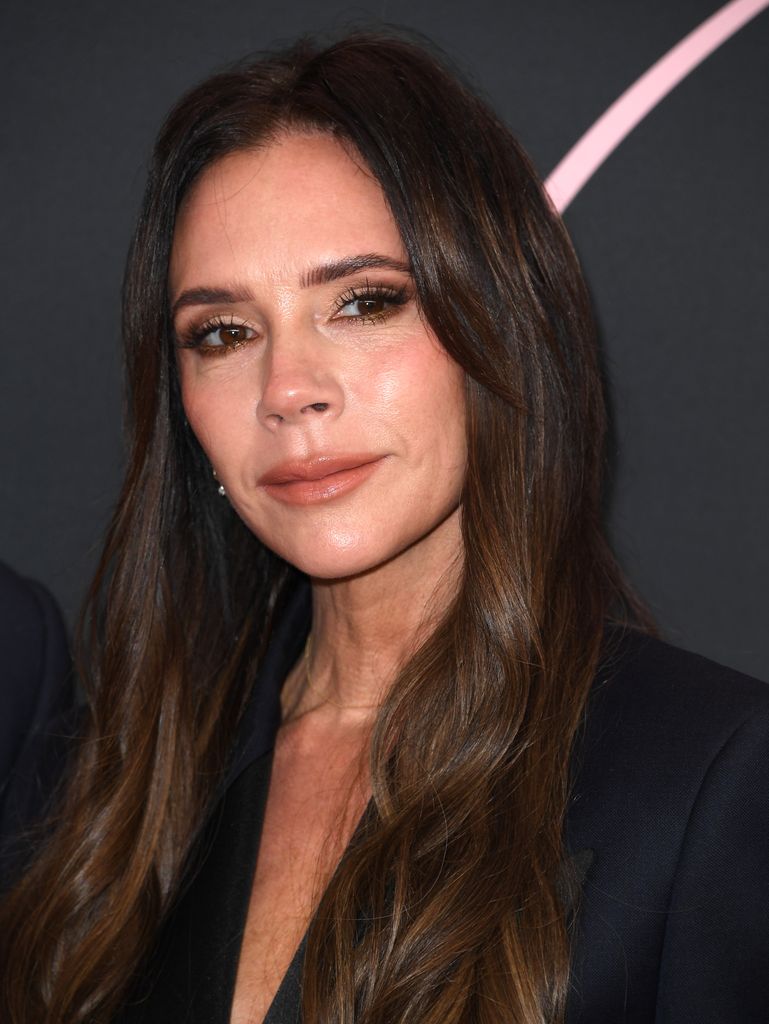 Victoria Beckham close up in black blazer