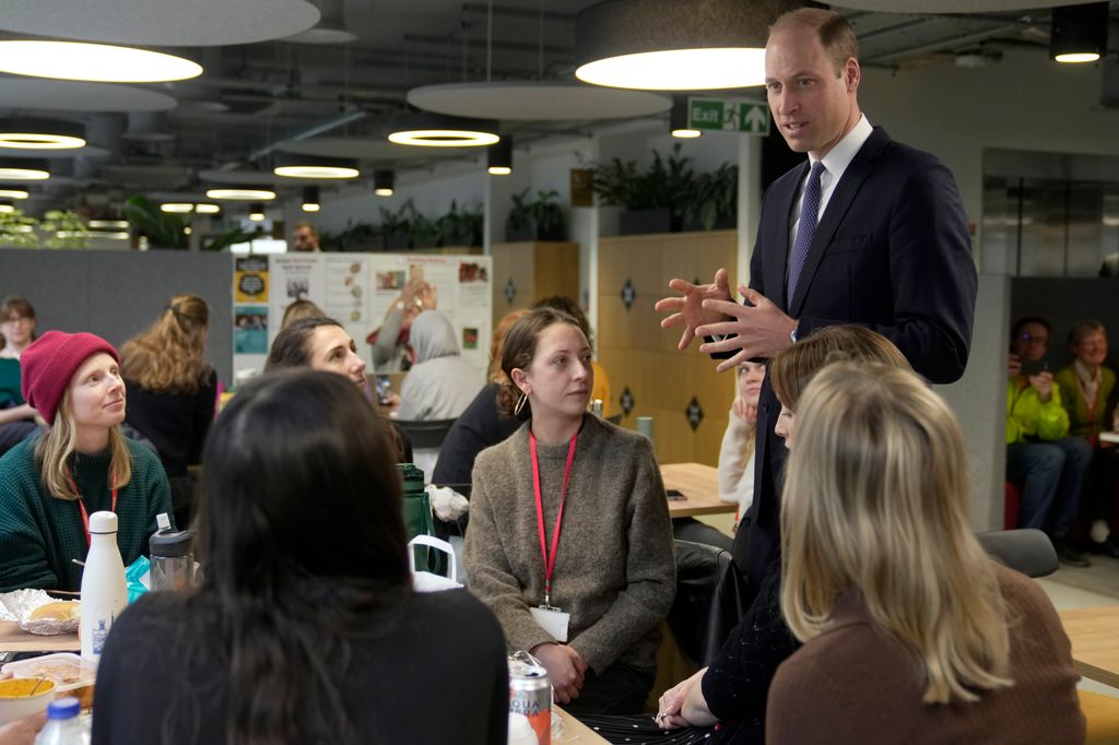 Prince William talks to employees as he visits the British Red Cross at British Red Cross HQ
