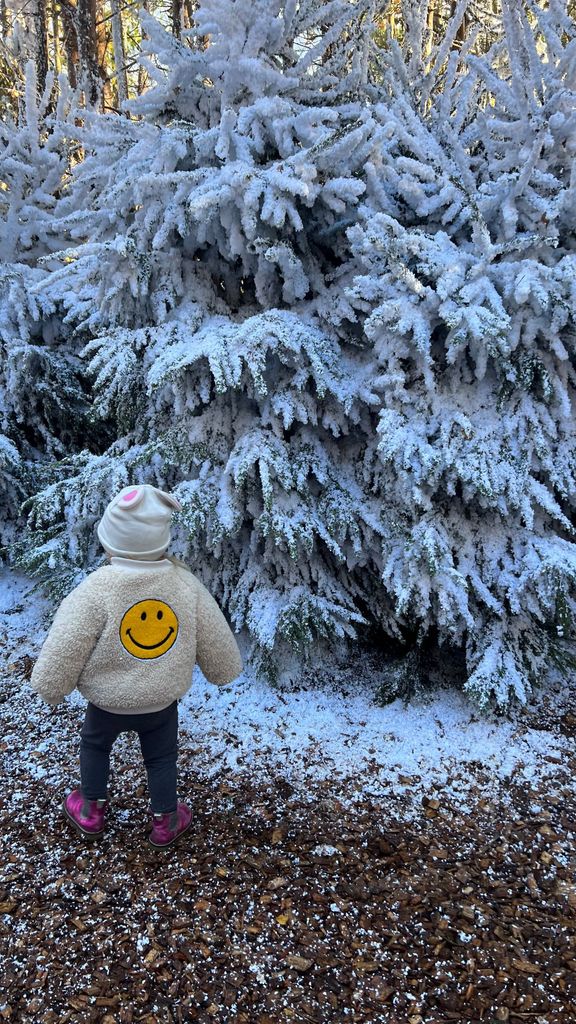 Romy looked adorable wearing a cosy cream fleece