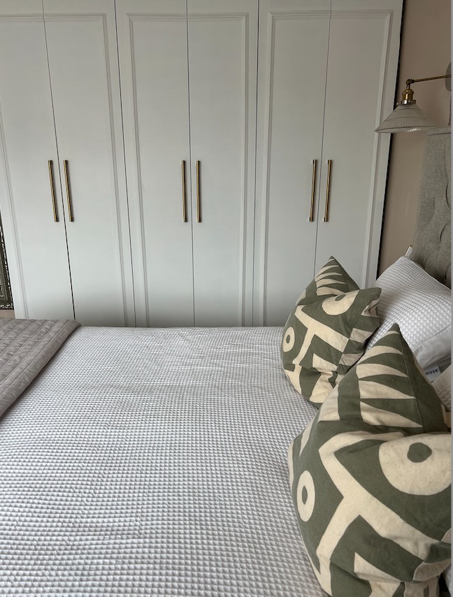 fitted wardrobes and bed