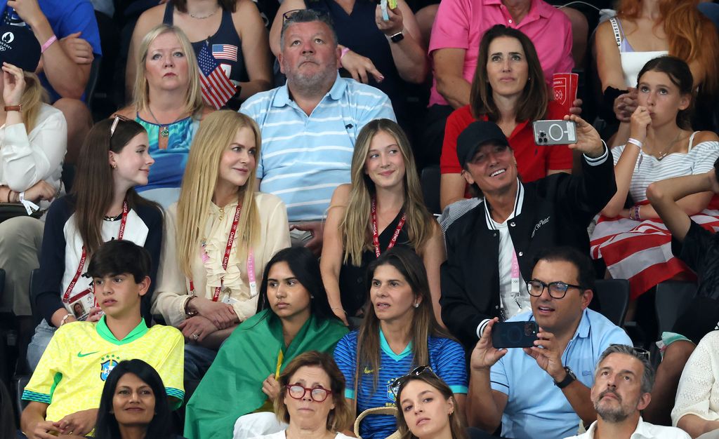 Nicole, Keith and their two girls are seen during the Artistic Gymnastics Women's Team Final 