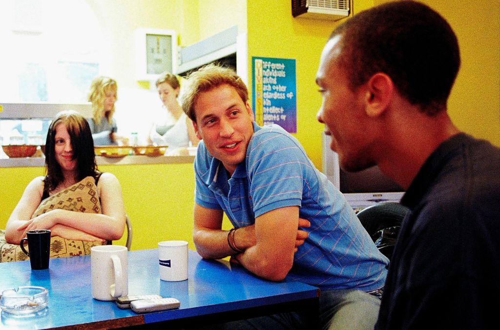 Prince William speaks to young people during a volunteering visit to homelessness charity Centrepoint in 2005