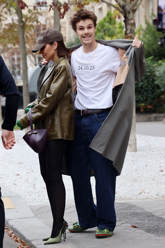 A photo of Cruz Beckham wearing a white T-shirt