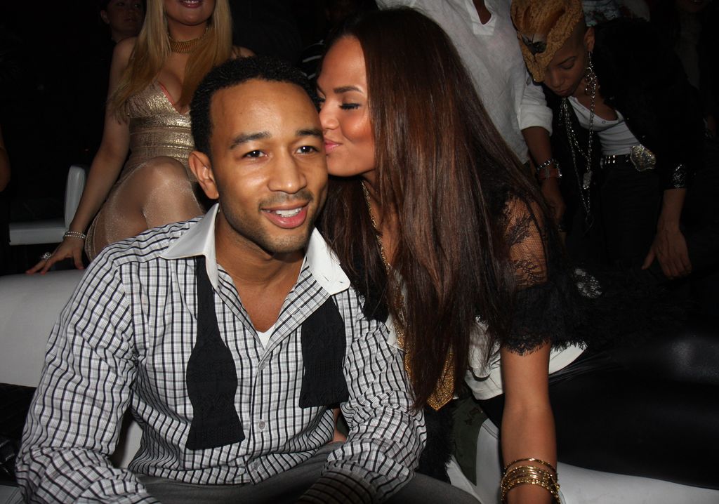 John Legend and Christine Teigen attend John Legend's birthday party at Lucky Strike on December 28, 2008 in New York City. 