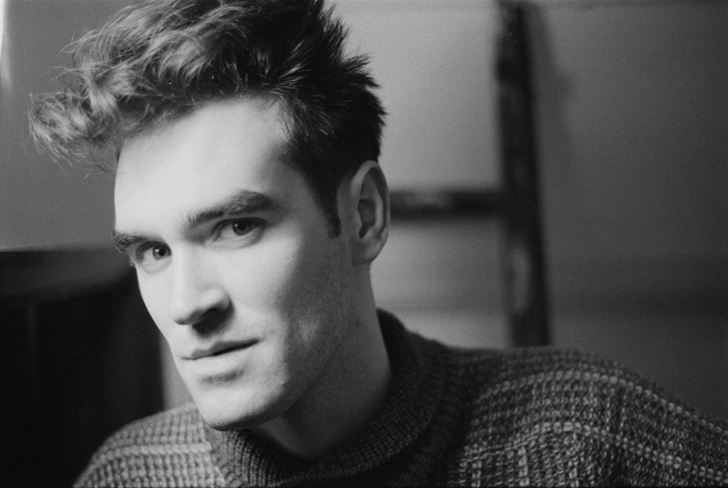 Headshot of British singer and songwriter Morrissey during a studio portrait session, 1984. Morrissey is the frontman of British rock band The Smiths. (Photo by Peter Noble/Redferns/Getty Images)