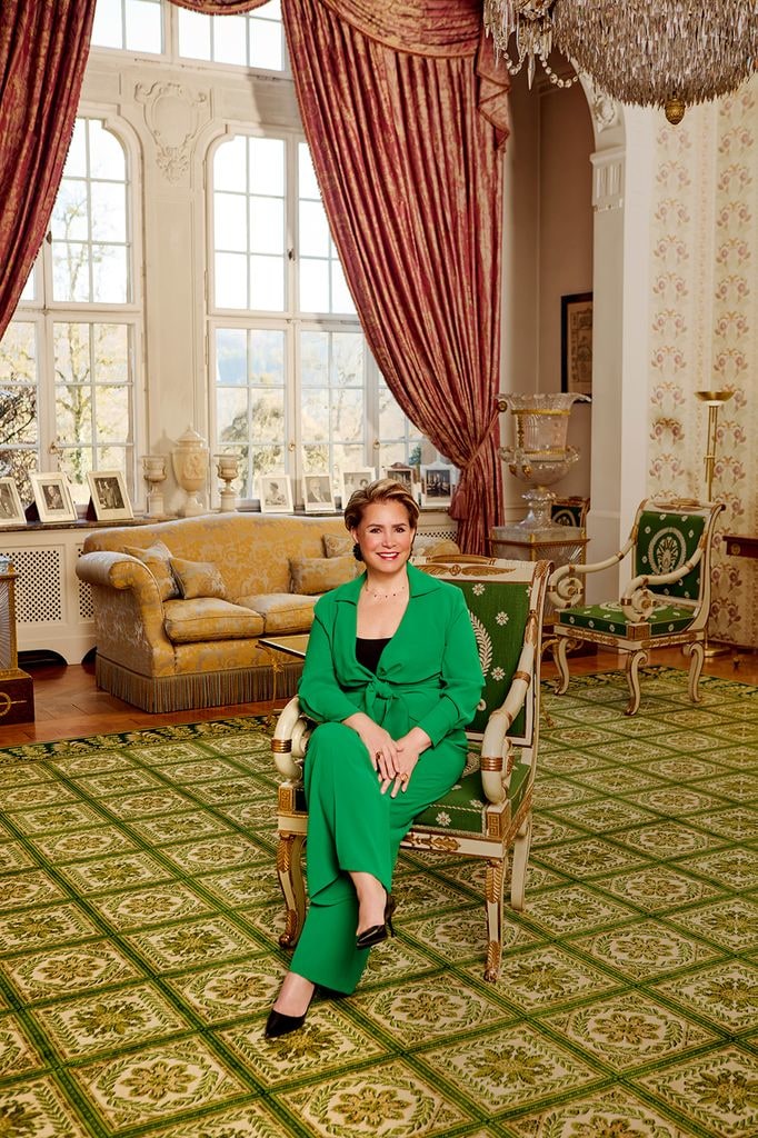 Grand Duchess Maria Teresa seated in green outfit at Berg Castle