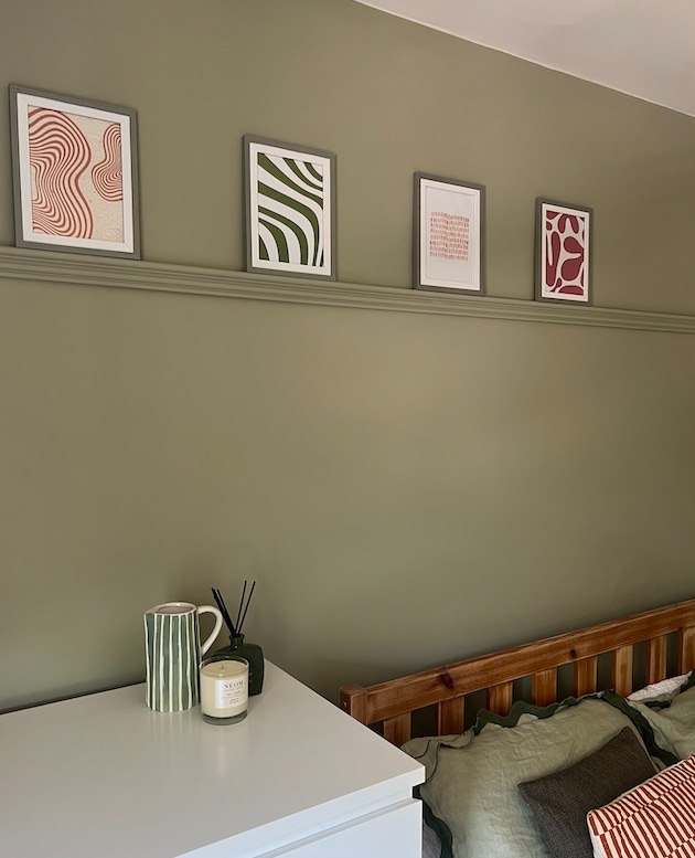 picture rail on green wall 