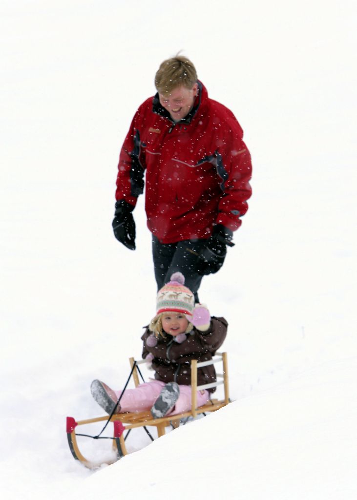 Princess Catharina-Amalia on a sleigh in the snow