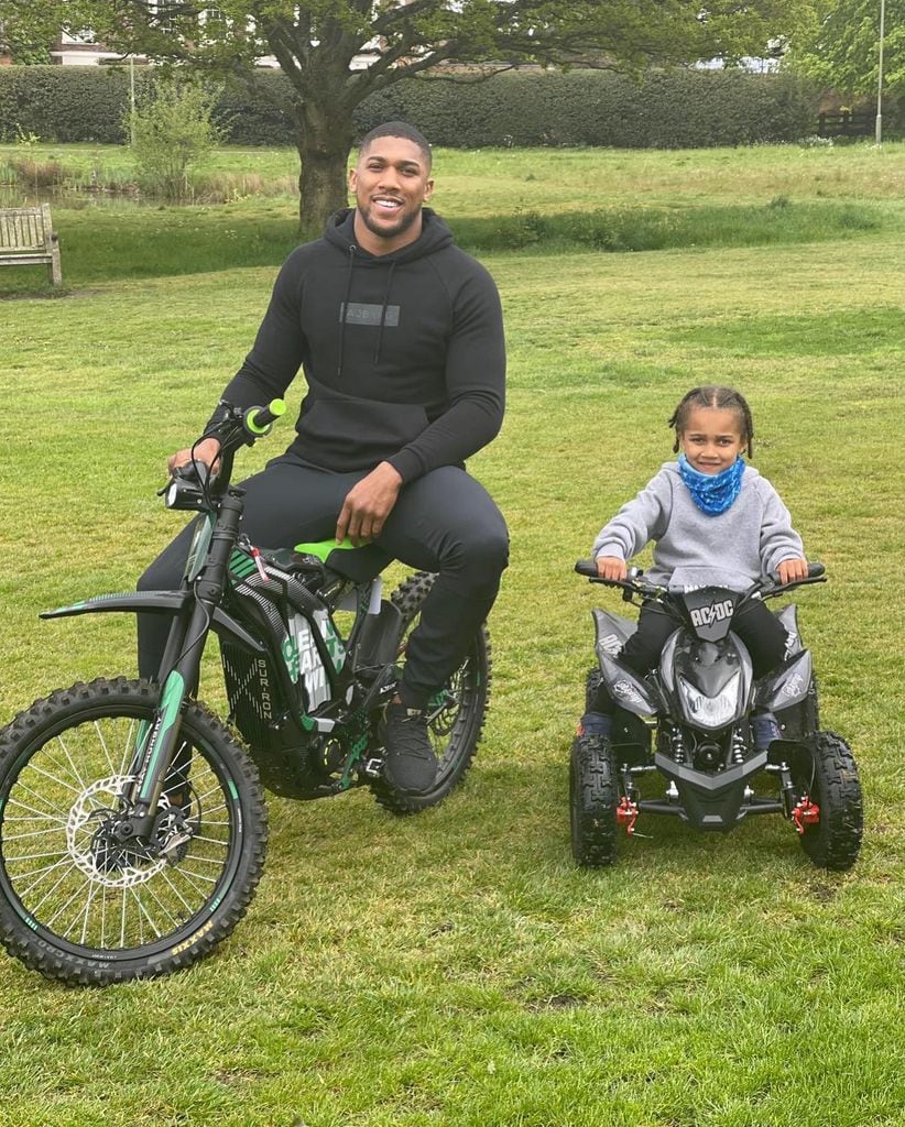 Anthony with son JJ on bikes