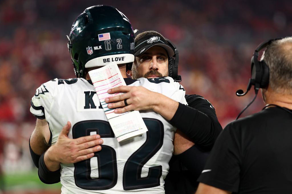 Jason Kelce #62 of the Philadelphia Eagles hugs head coach Nick Sirianni during the fourth quarter of an NFL wild-card playoff football game against the Tampa Bay Buccaneers at Raymond James Stadium on January 15, 2024 in Tampa, Florida