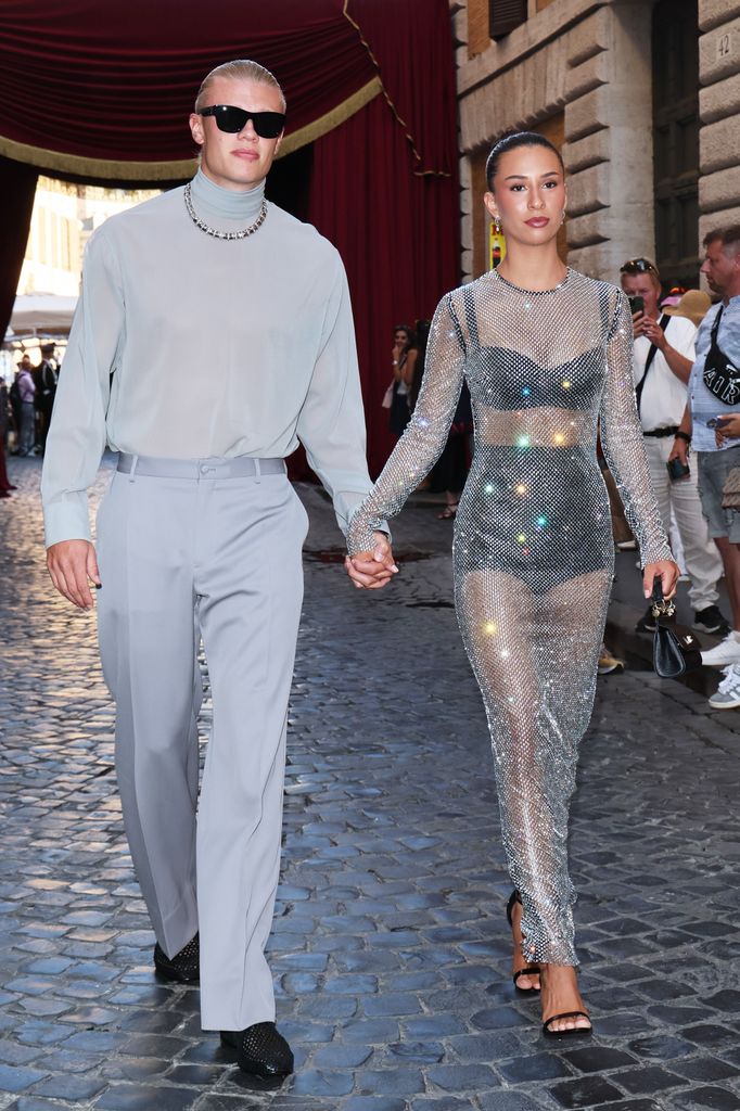 Erling Haaland and Isabel Haugseng Johansen are seen outside the Dolce & Gabbana 'Alta Sartoria' fashion show 