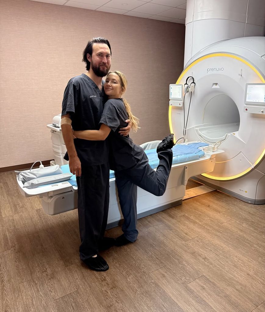 Kate and her husband posing for scan