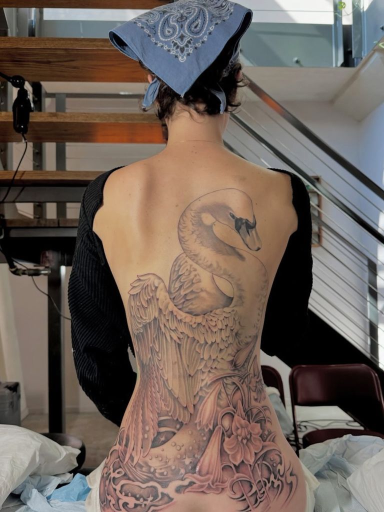 photo of ella emhoff huge swan tattoo on back