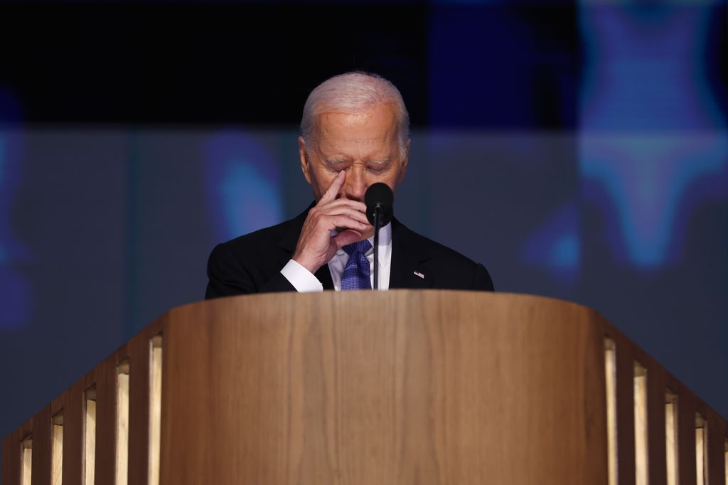 President Joe Biden speaks onstage during the first day of the Democratic National Convention at the United Center 