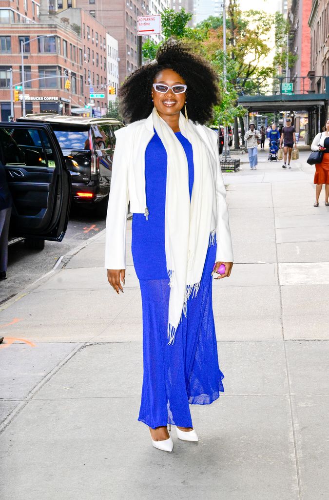 Jennifer Hudson is seen in New York City in cobalt dress and white jacket and scarf