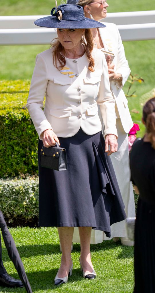 Sarah Ferguson wearing white and navy outfit