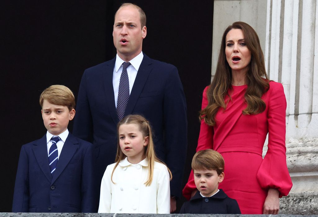 Kate and William on the royal balcony with their children