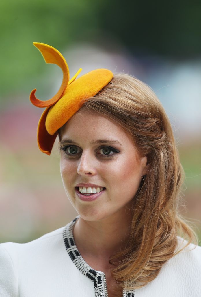Princess Beatrice in orange hat