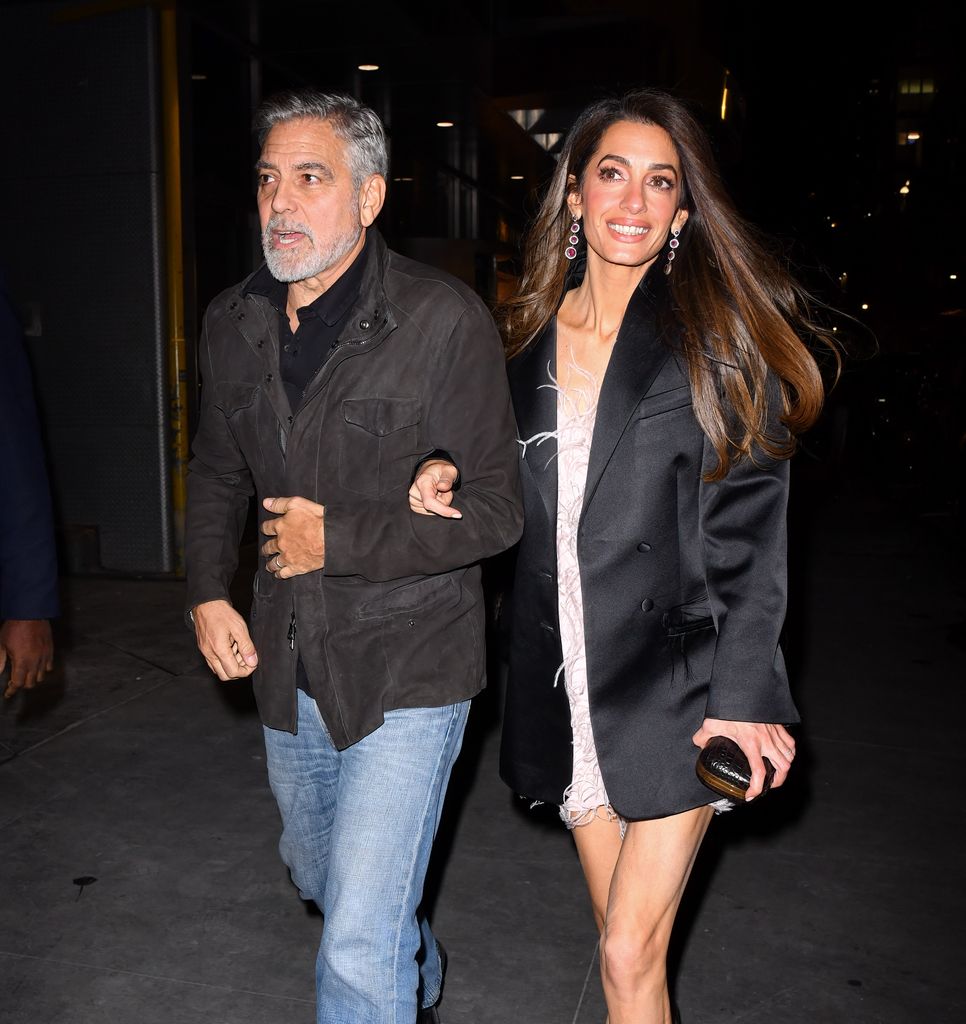 George Clooney and Amal Clooney arrive to the Polo Bar on December 13, 2023 in New York City. (Photo by James Devaney/GC Images)