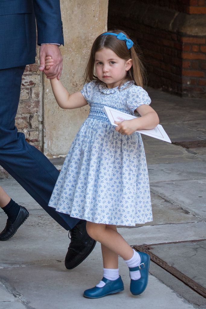 Princess Charlotte wearing an adorable headband at her brother Prince Louis' Christening