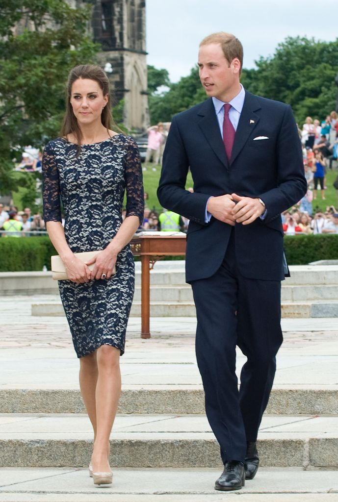 Catherine and Prince William walking down steps 