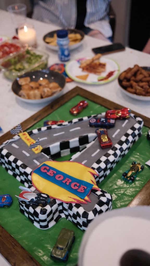 Adam surprised his son George with a car-themed birthday cake