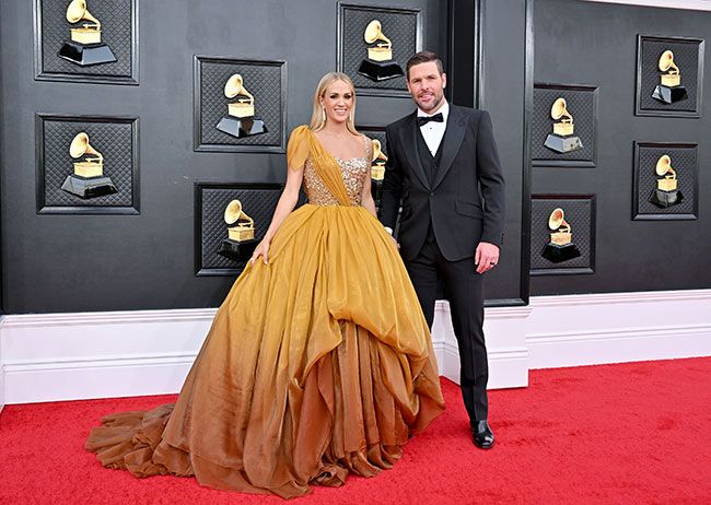 carrie underwood mike fisher divided home life