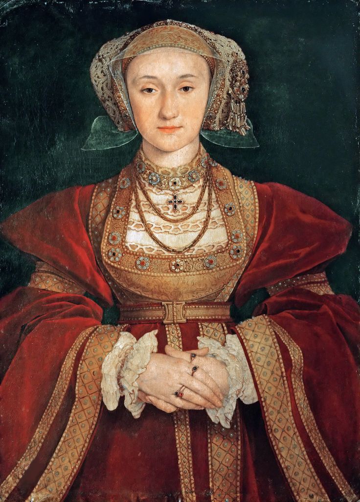 Anne of Cleves dressed in red with a green headdress