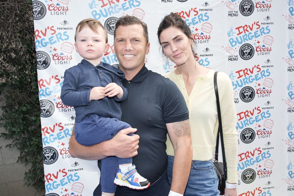 Sean Avery and Hilary Rhoda with their son Nash celebrate National Burger Day at the friends and family preview party for the new Irv's Burgers on May 28, 2022 in Los Angeles, California