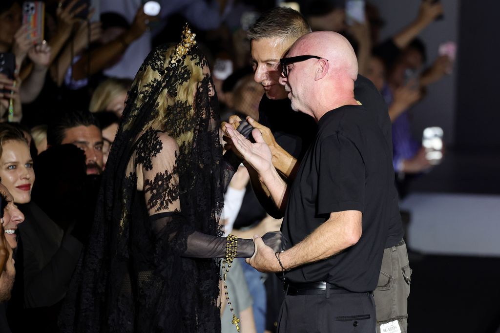 Madonna, Domenico Dolce and Stefano Gabbana are seen on the runway