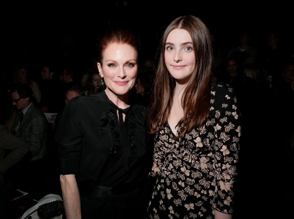 Julianne Moore and Liv Freundlich in the front row (Photo by Swan Gallet/WWD/Penske Media via Getty Images)l