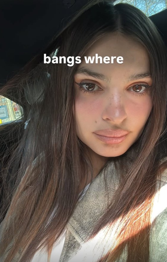 emily ratajkowski taking a selfie with new long hair