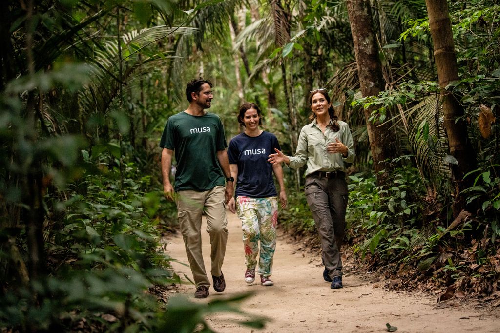 Mary taking a walk through the forest reserve in Brazil