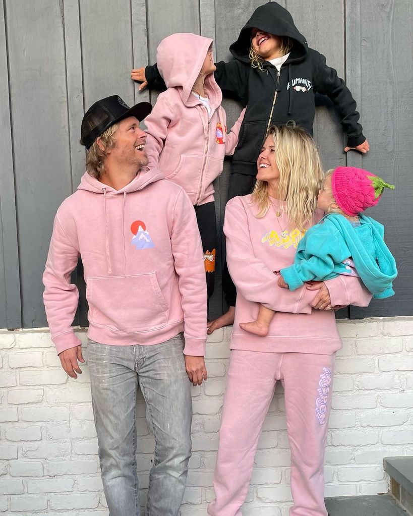 Eric Christian Olsen and Sarah Wright Olsen with their three kids