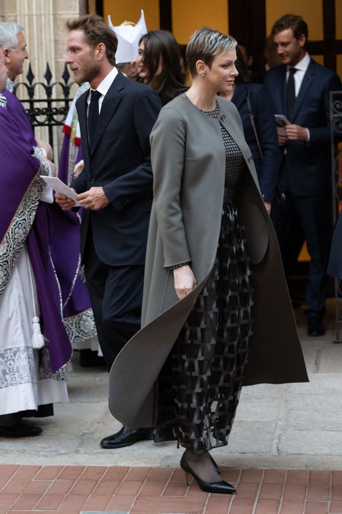 princess charlene in an Akris outfit that perfectly complemented her peppery pixie cut