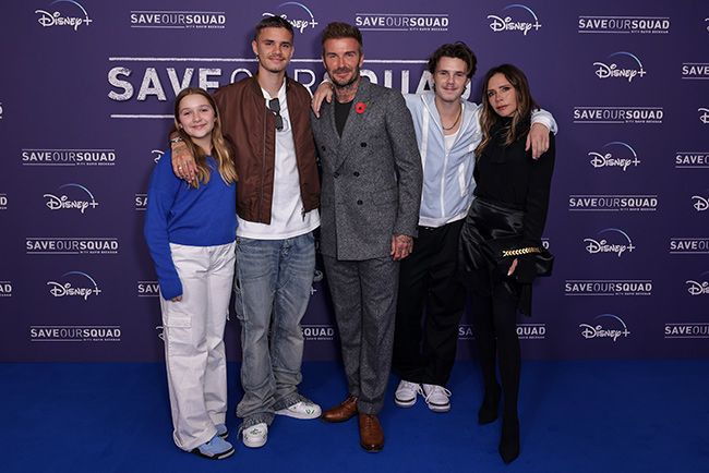 The Beckham family posing together at Save the Squad premiere